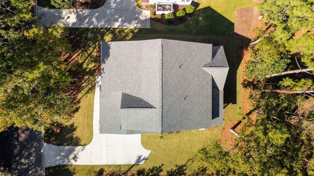 Front exterior of a new home in , Johns Island, SC, highlighting curb appeal (Image 1).