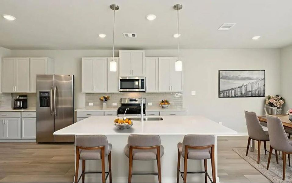 Photo is not of the actual home, but is an inspirational photo of builder’s model home and may depict options, furnishings, and/or decorator features that are not included