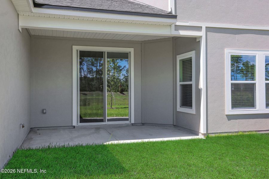 Exterior details and patio area of a home in Cordova Palms, St. Augustine (Image 26). Exterior details and patio area of a home in Cordova Palms, St. Augustine (Image 26).