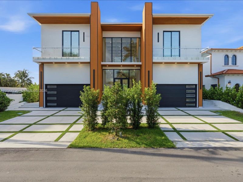 Front exterior of a new home in , Pompano Beach, FL, highlighting curb appeal (Image 2).