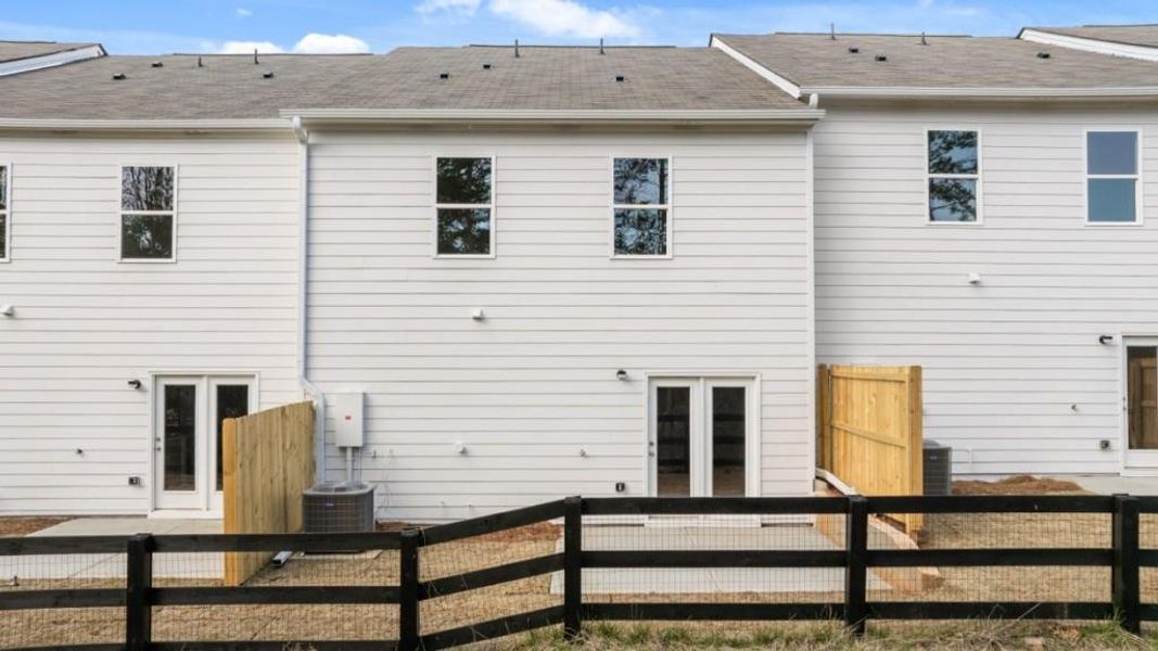 Exterior details and patio area of a home in Falcon Landing, Gainesville (Image 2).