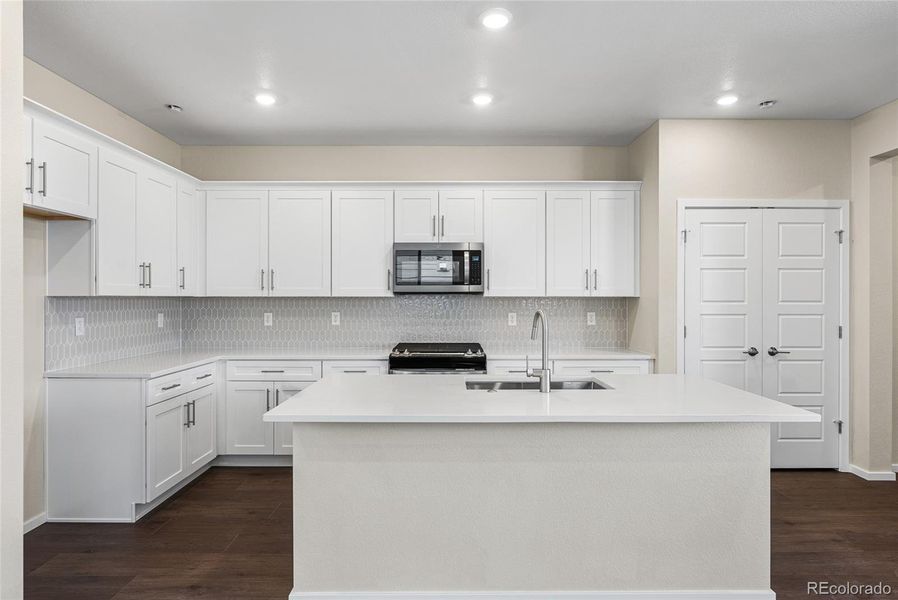 Furnished interior view inside a new home in Barefoot Village, Firestone (Image 7).