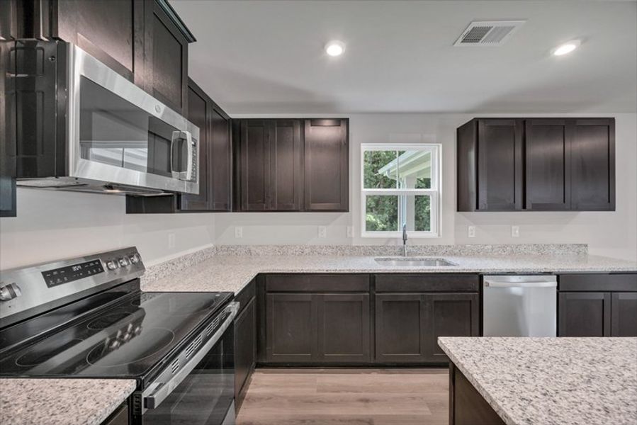Furnished interior view inside a new home in Cameron Ridge 2-Story, Columbia (Image 4). Furnished interior view inside a new home in Cameron Ridge 2-Story, Columbia (Image 4).