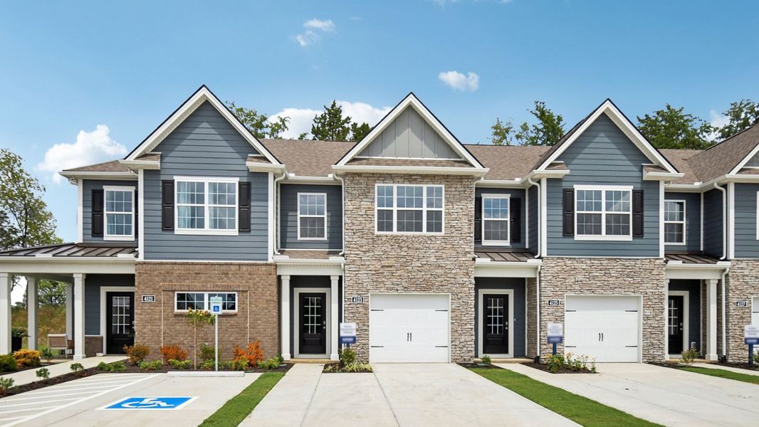 Front exterior of a new home in River Landing Townhomes, Murfreesboro, TN, highlighting curb appeal (Image 1).