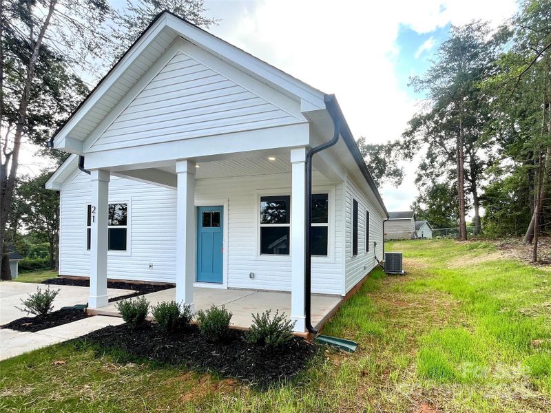 Front exterior of a new home in , Granite Falls, NC, highlighting curb appeal (Image 18).