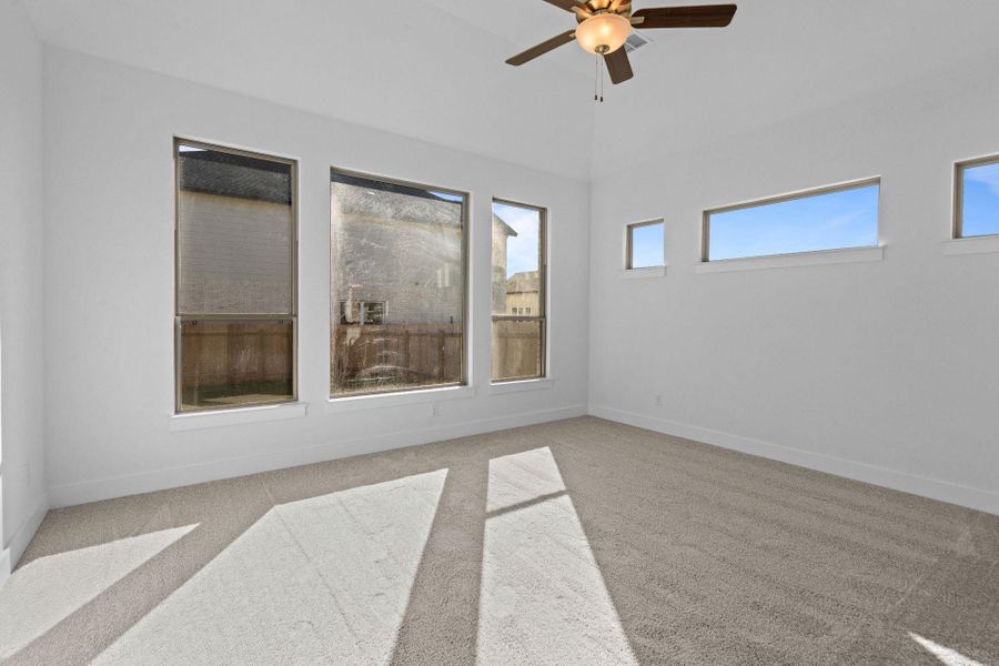 Primary Bedroom with elevated ceiling Primary Bedroom with elevated ceiling
