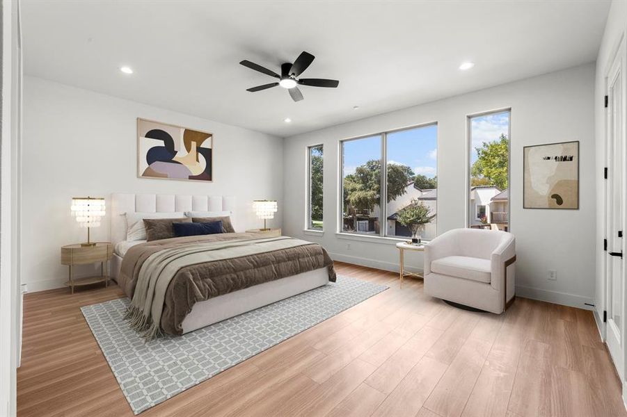 Virtually staged primary bedroom facing the front of home.