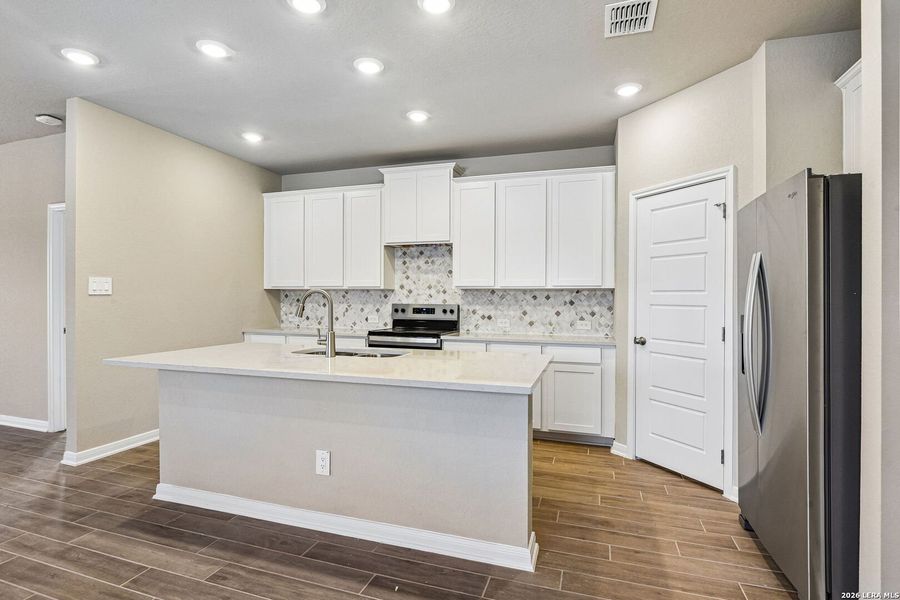Furnished interior view inside a new home in Royal Crest, San Antonio (Image 8).