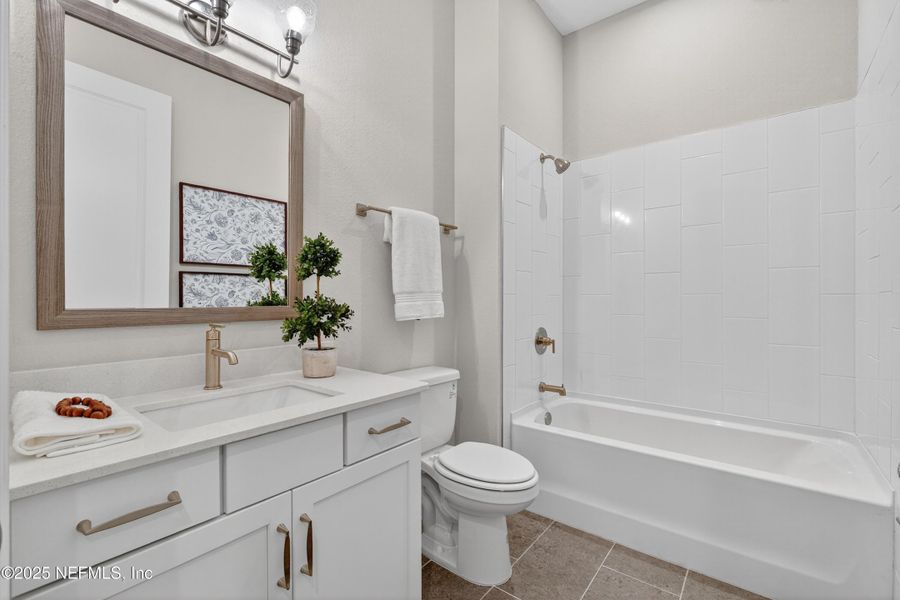 Furnished interior view inside a new home in RiverTown - WaterSong, St. Johns (Image 13).