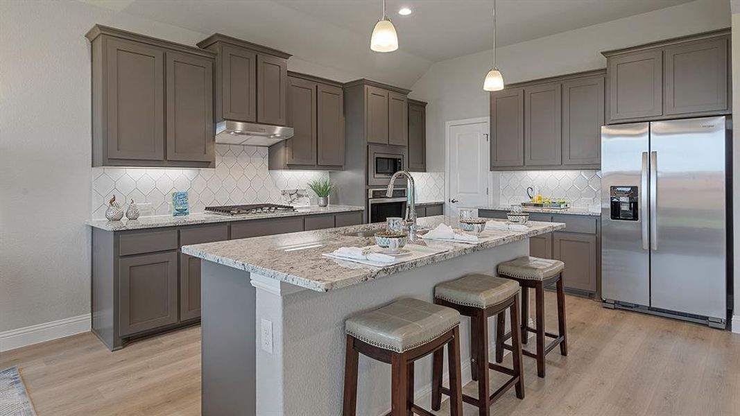 Kitchen - All Home and community information, including pricing, included features, terms, availability and amenities, are subject to change at any time without notice or obligation. All Drawings, pictures, photographs, video, square footages, floor plans, elevations, features, colors and sizes are approximate for illustration purposes only and will vary from the homes as built. Kitchen - All Home and community information, including pricing, included features, terms, availability and amenities, are subject to change at any time without notice or obligation. All Drawings, pictures, photographs, video, square footages, floor plans, elevations, features, colors and sizes are approximate for illustration purposes only and will vary from the homes as built.