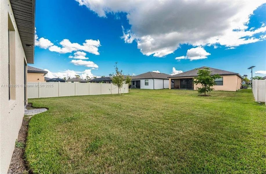 Exterior details and patio area of a home in , Port Charlotte (Image 24).