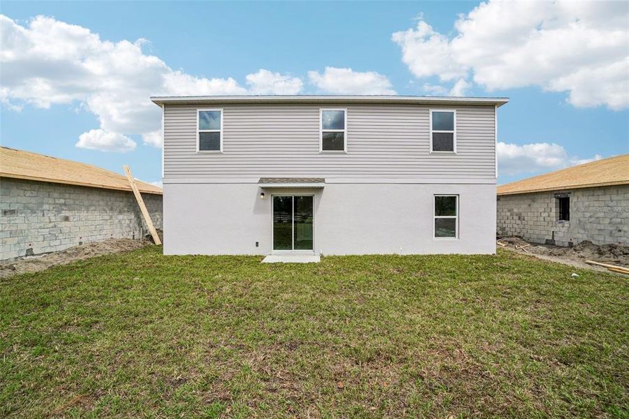 Exterior details and patio area of a home in Sumter Villas, Sumterville (Image 4).