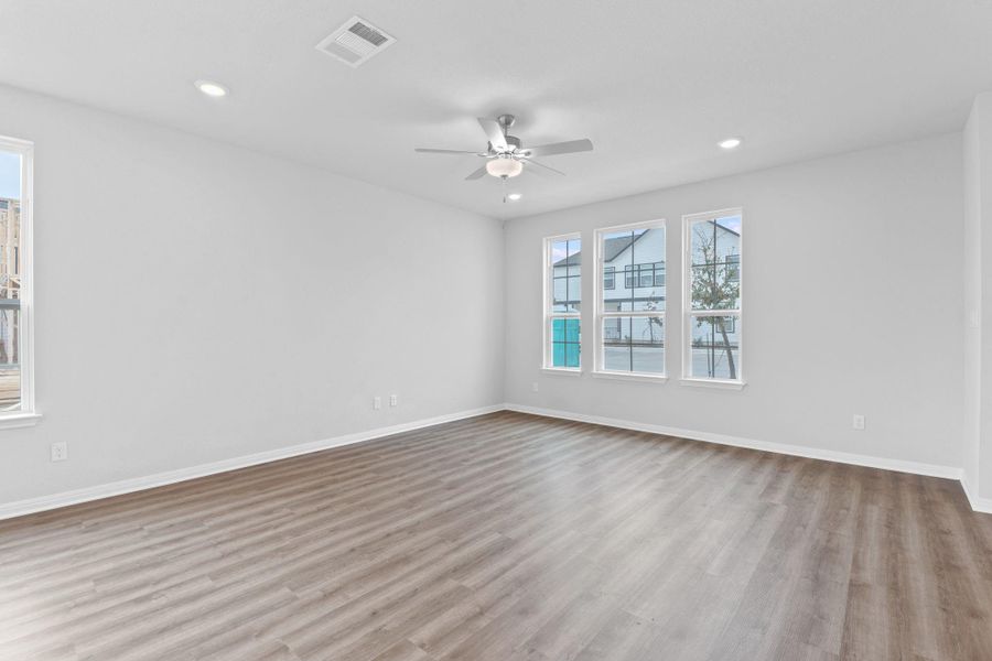 Spacious, unfurnished interior of a new home in Retreat at Hero Way, Leander (Image 28).