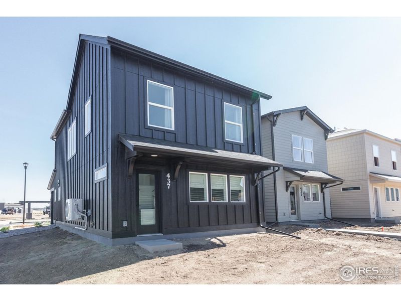 Exterior details and patio area of a home in Prairie Song Story Collection - Single Family Homes, Windsor (Image 3).