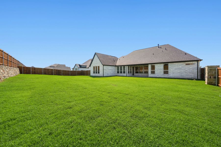 Exterior details and patio area of a home in Winding Creek, Rockwall (Image 4).