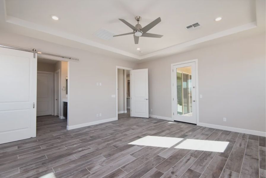 Spacious, unfurnished interior of a new home in Bellero Estates, Queen Creek (Image 21).