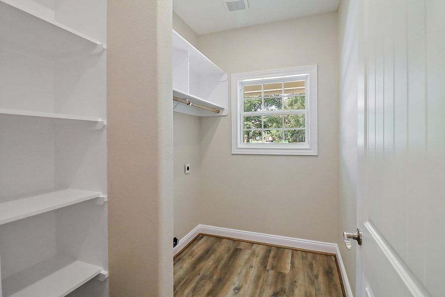 Laundry room with built in shelves Laundry room with built in shelves