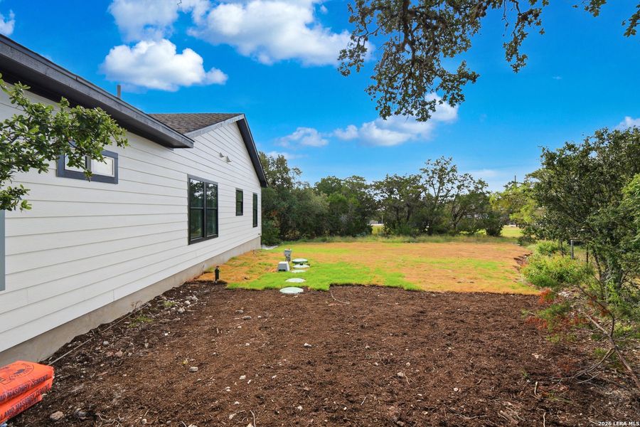 Exterior details and patio area of a home in , Spring Branch (Image 4).