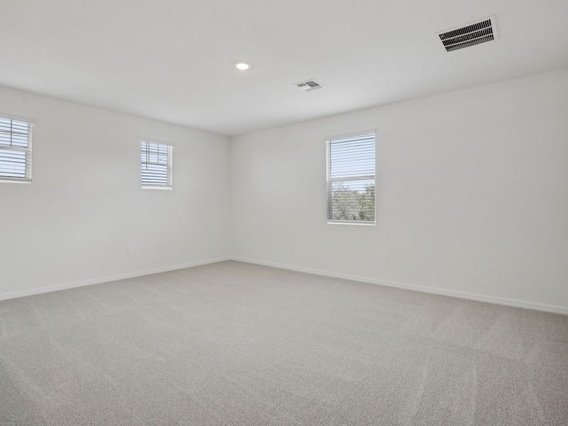 Spacious, unfurnished interior of a new home in Coasterra - Reserve Series, Palmetto (Image 18).