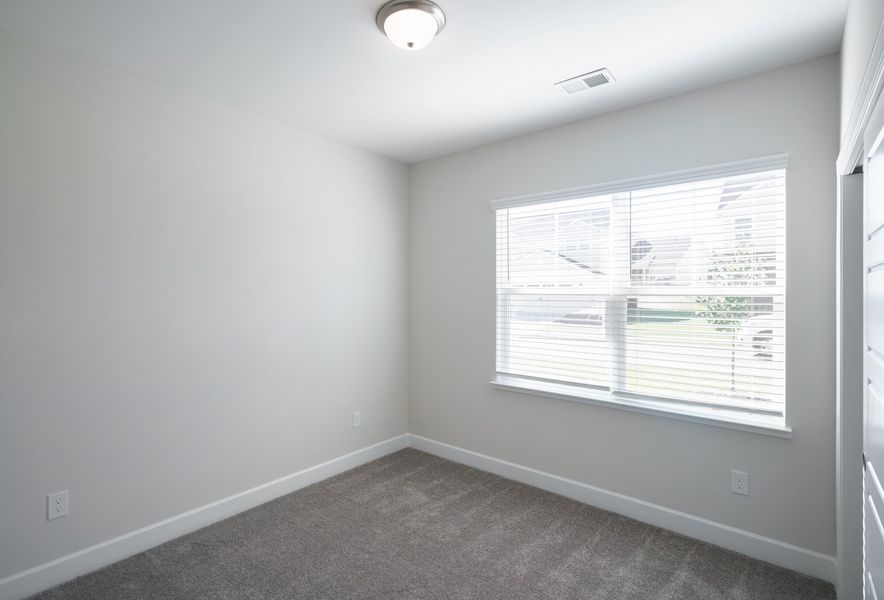 Representative unfurnished interior of a home built from the The Harper by Cothran Homes in Holly Ridge, Greenville (Image 27).