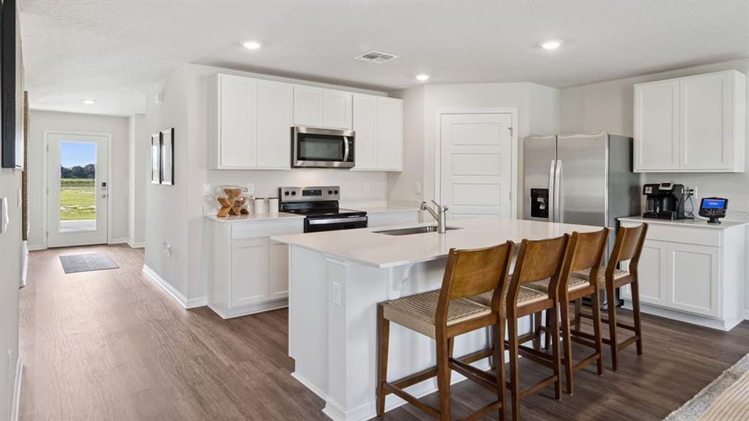Furnished interior view inside a new home in Bradbury Creek, Haines City (Image 9).