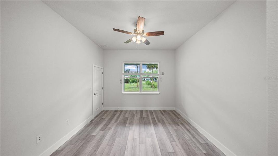 Spacious, unfurnished interior of a new home in , Port Charlotte (Image 19).