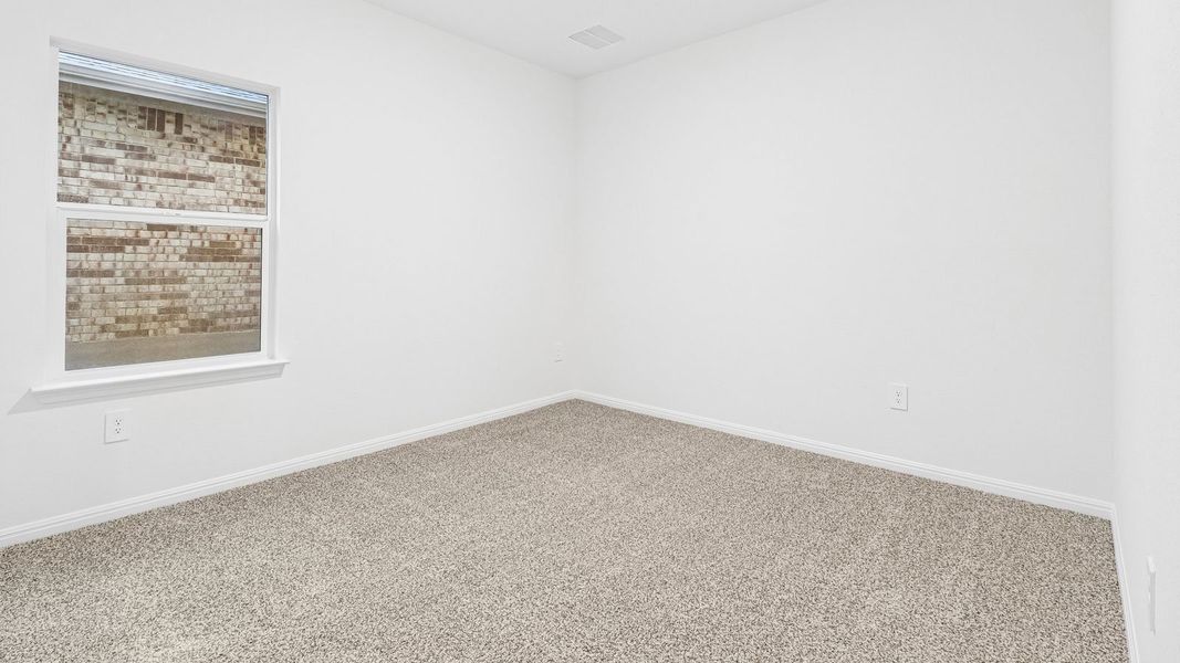 Spacious, unfurnished interior of a new home in Bar W Ranch, Leander (Image 24).
