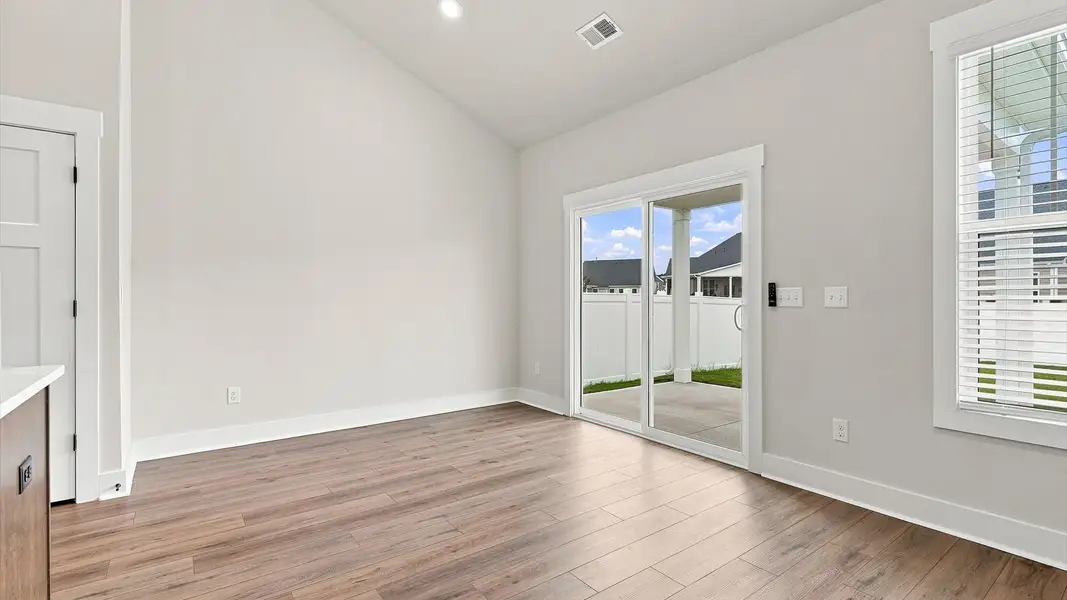 Inviting breakfast area with a seamless connection to the kitchen for everyday living at Walnut Ridge