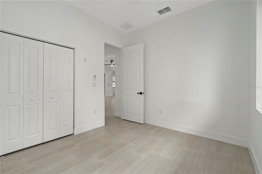 Spacious, unfurnished interior of a new home in , New Port Richey (Image 24).