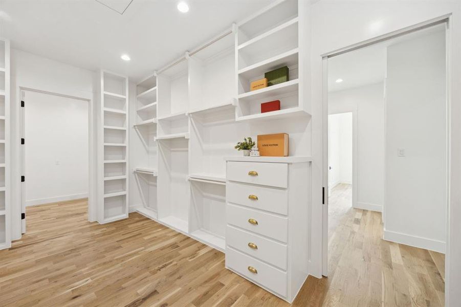 Wow ... look at this closet! Custom built-ins and a flexible space that serves as a second closet, safe room, or additional storage. Wow ... look at this closet! Custom built-ins and a flexible space that serves as a second closet, safe room, or additional storage.