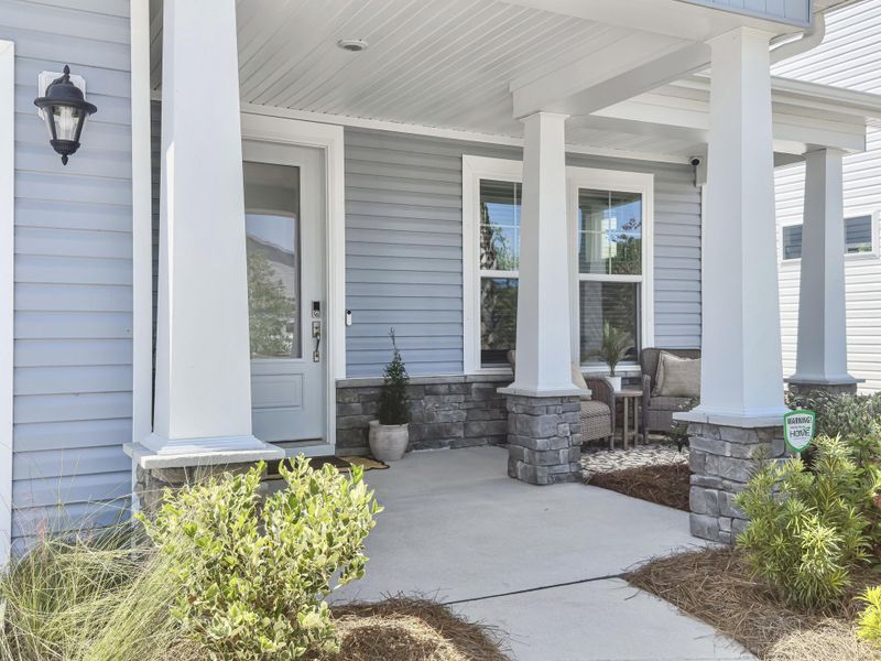 Exterior details and patio area of a home in The Groves of Berkeley, Moncks Corner (Image 24).