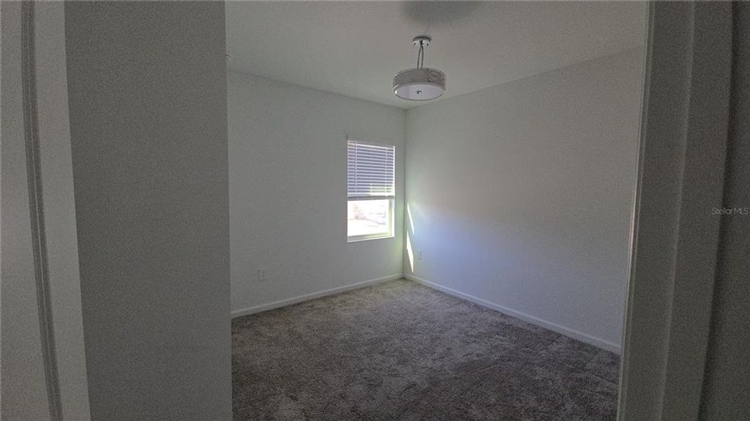 Spacious, unfurnished interior of a new home in Rhett's Ridge, Apopka (Image 23).