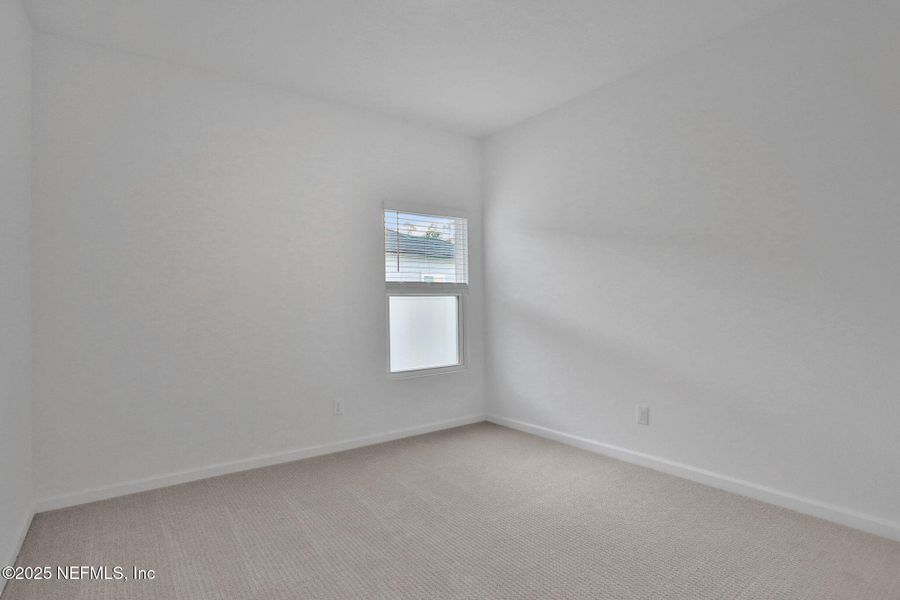 Spacious, unfurnished interior of a new home in Cordova Palms, St. Augustine (Image 36).