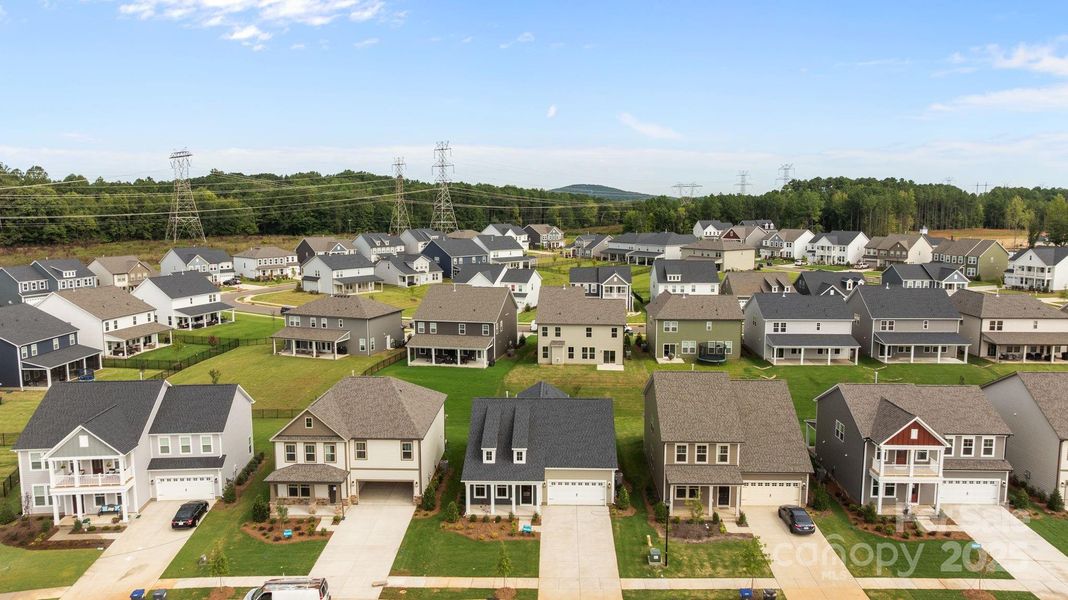 Front exterior of a new home in Lakeside Glen, York, SC, highlighting curb appeal (Image 21). Front exterior of a new home in Lakeside Glen, York, SC, highlighting curb appeal (Image 21).