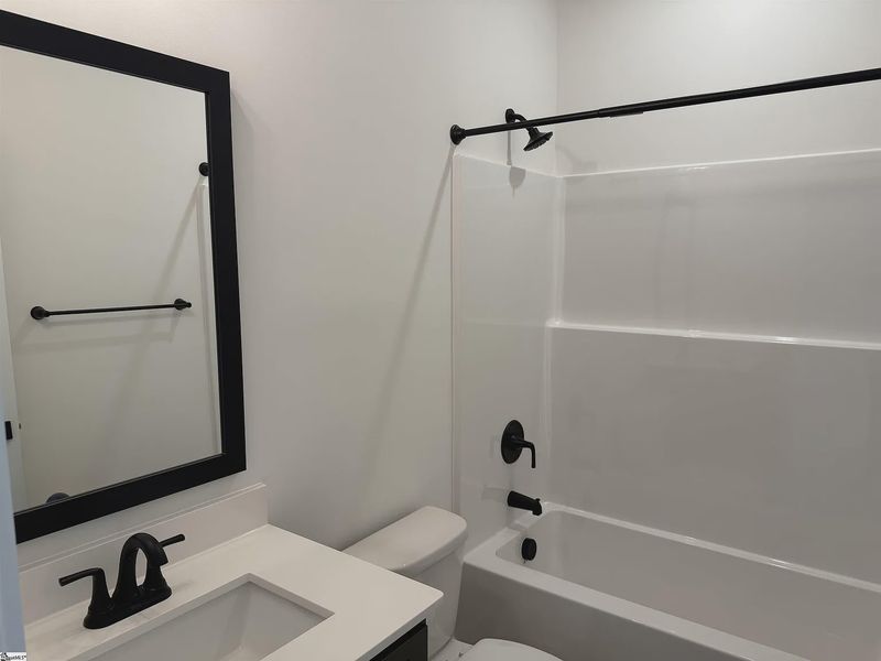 Furnished interior view inside a new home in Hidden Lake Estates, Greenville (Image 8).