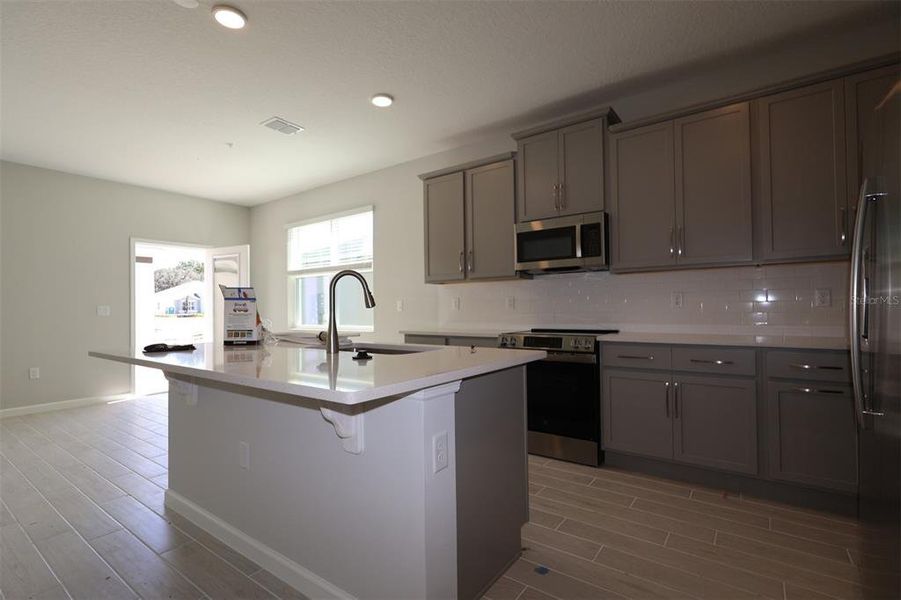 Furnished interior view inside a new home in Emerson Pointe, Apopka (Image 7). Furnished interior view inside a new home in Emerson Pointe, Apopka (Image 7).