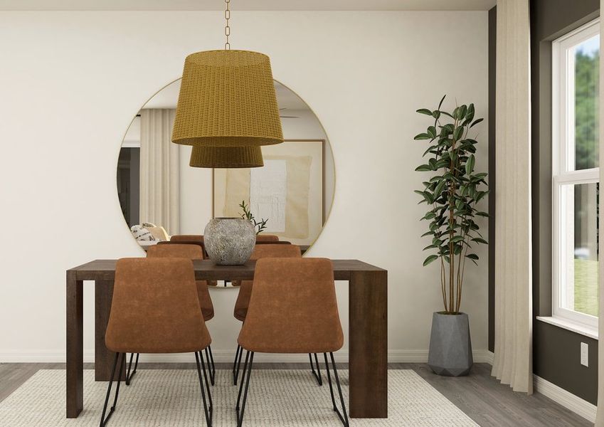 Rendering of a  dining room furnished with a brown table surrounded by four chairs. There is  a large round mirror on the wall behind the table