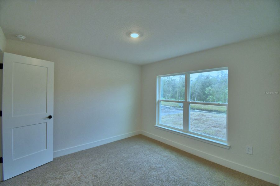 Spacious, unfurnished interior of a new home in Cadence Crossing, Auburndale (Image 37).
