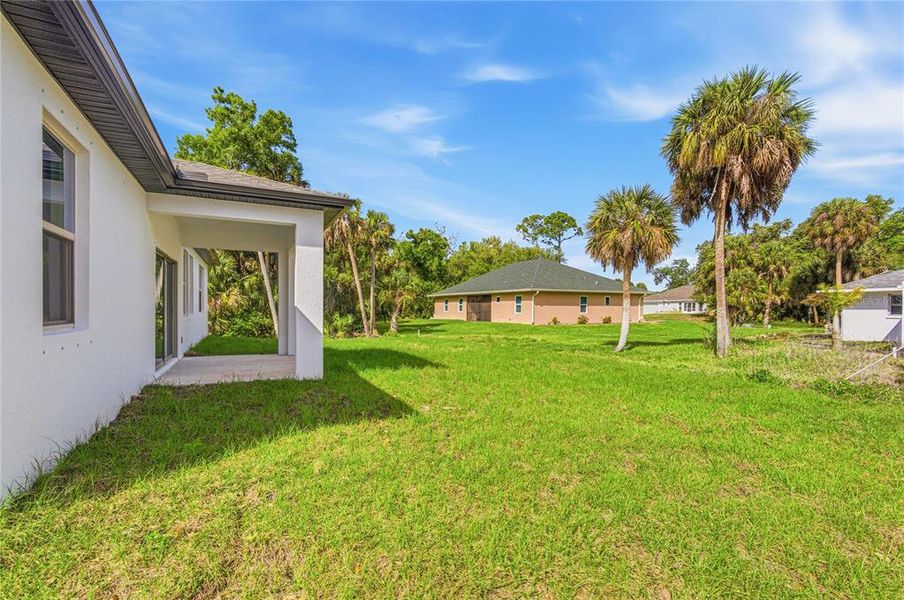 Exterior details and patio area of a home in , North Port (Image 28).