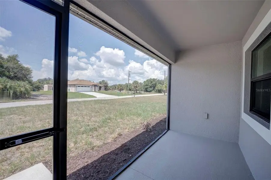 Exterior details and patio area of a home in , Port Charlotte (Image 3).