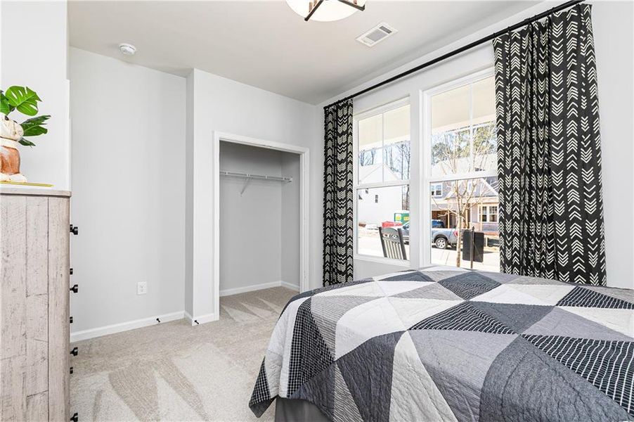 Furnished interior view inside a new home in Madison at Buice Lake, Acworth (Image 8). Furnished interior view inside a new home in Madison at Buice Lake, Acworth (Image 8).