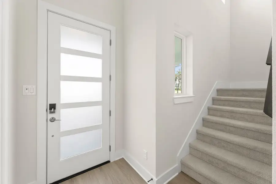 Spacious, unfurnished interior of a new home in Carriage Collection at Painted Tree, McKinney (Image 13).