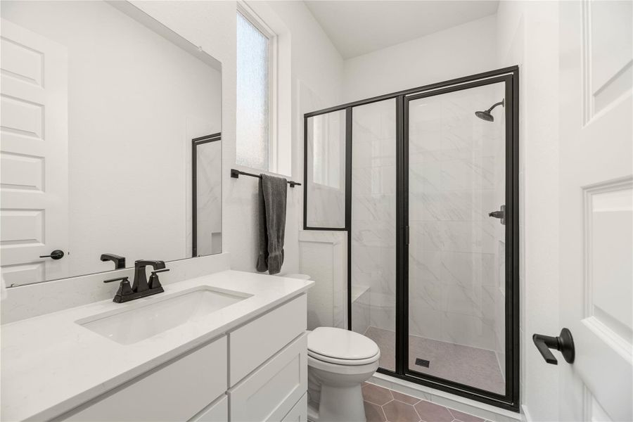 Furnished interior view inside a new home in Bridgeland, Cypress (Image 14).