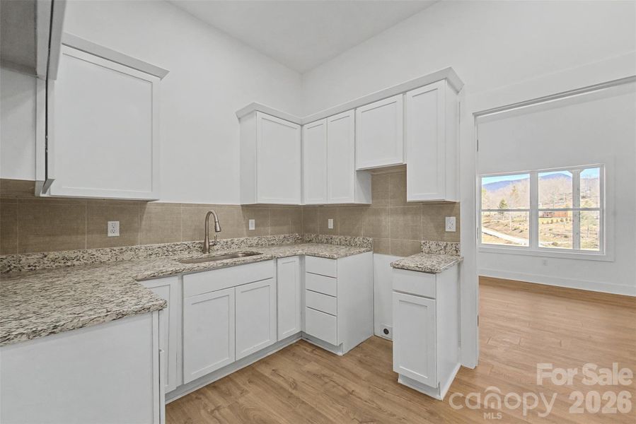 Furnished interior view inside a new home in , Tuckasegee (Image 17).