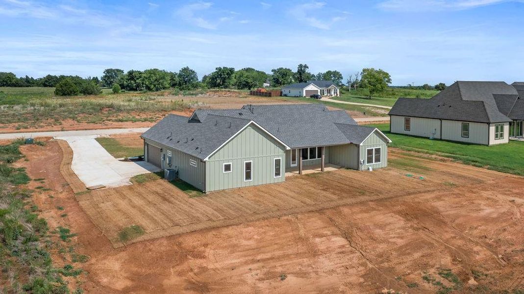 Front exterior of a new home in , Whitesboro, TX, highlighting curb appeal (Image 22).