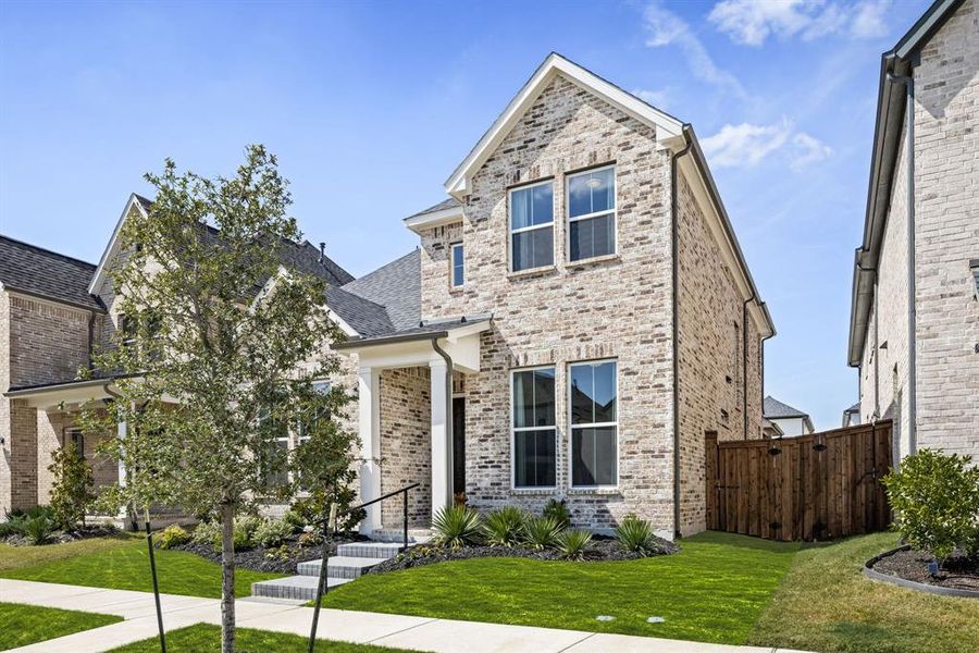 Front exterior of a new home in , Frisco, TX, highlighting curb appeal (Image 1). Front exterior of a new home in , Frisco, TX, highlighting curb appeal (Image 1).