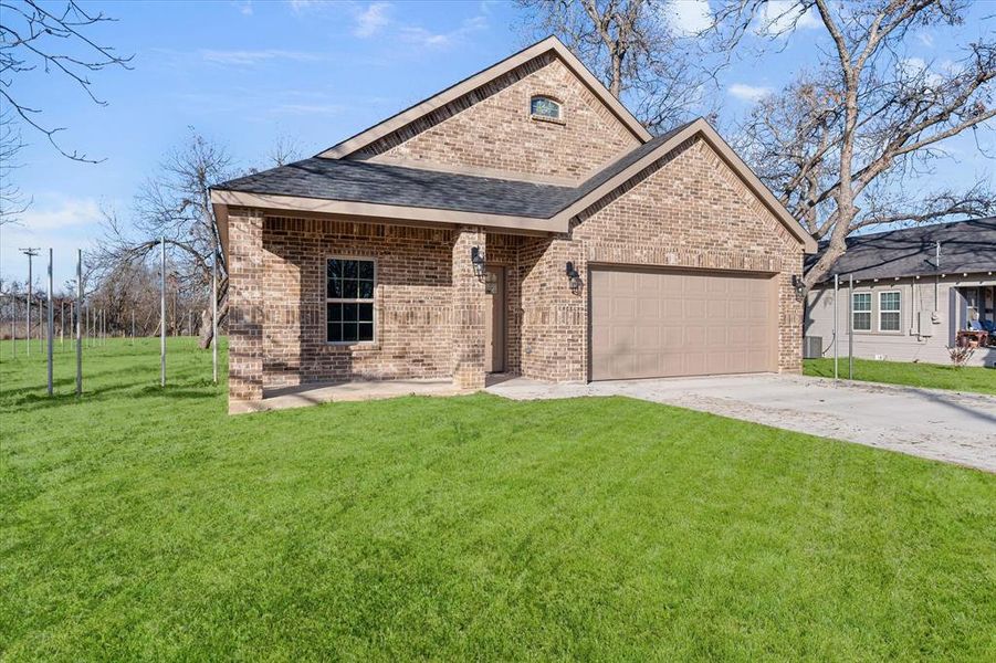 Front exterior of a new home in , Kerens, TX, highlighting curb appeal (Image 17).