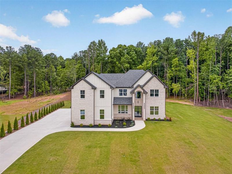 Front exterior of a new home in , Jefferson, GA, highlighting curb appeal (Image 27).