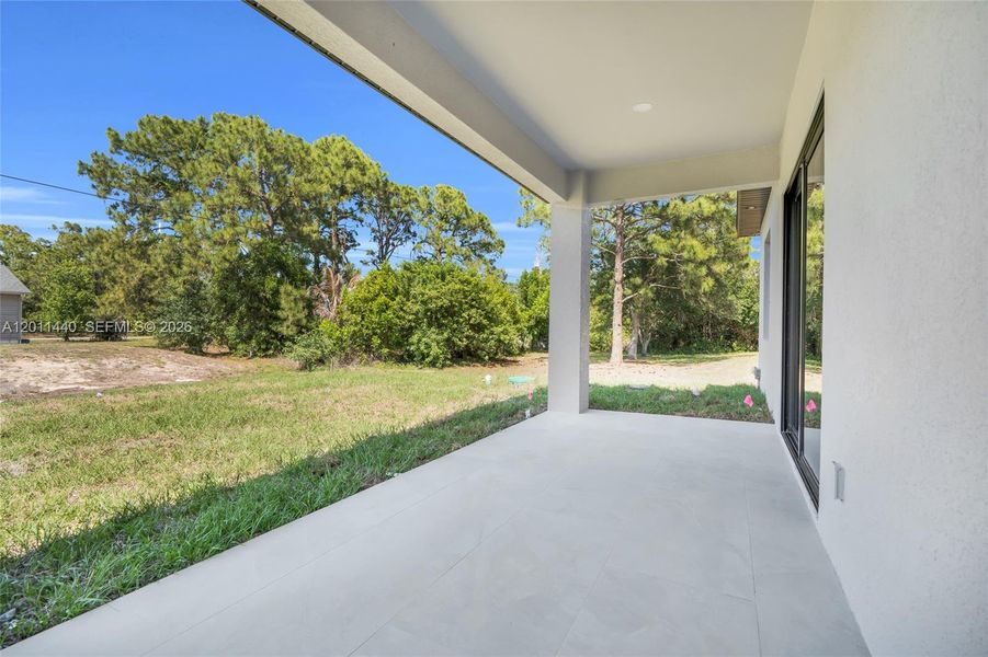 Exterior details and patio area of a home in , Lehigh Acres (Image 4).