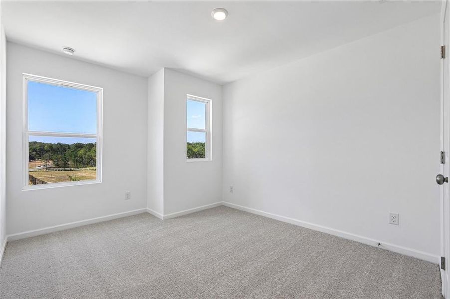 Spacious, unfurnished interior of a new home in Weatherfield, Buford (Image 25).